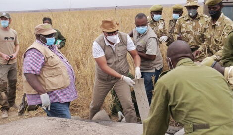 Tourism CS Najib Balala (third left) takes part in Elephant Collaring Exercise at Amboseli National Park
