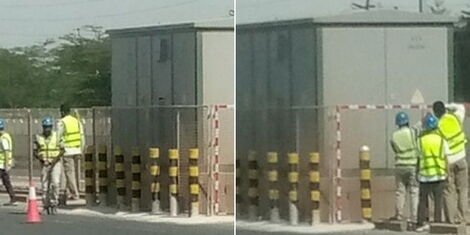 Workers placing warning tapes around the power station on Nairobi Expressway along Mombasa Road on May 12.