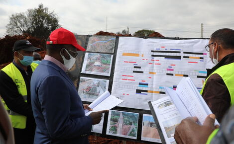 Transport Cabinet Secretary James Macharia (Red Cap) inspecting the construction of the James Gichuru Jn - Rironi road in August 2020.