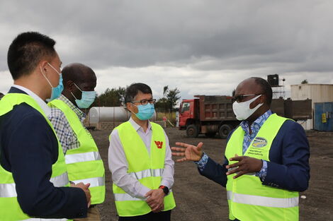 Transport Cabinet Secretary James Macharia with Kenol-Marua dual carriageway contractors, July 2020.