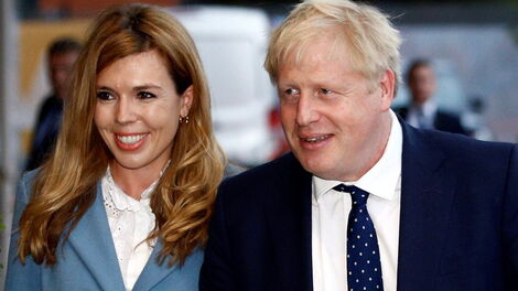 UK PM Boris Johnson (right) and his wife Carrie.