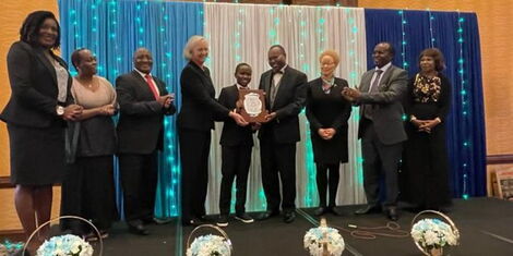 US ambassador to Kenya Meg Whitman hands over the Jurist of the Year Award to Justice Joel Ngugi on Friday December, 9, 2022