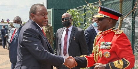 President Uhuru Kenyatta being received by the Chief of the Kenya Defence Forces (KDF) Gen Robert Kariuki Kibochi at Uhuru Gardens for Madaraka Day celebrations on June 1, 2022.