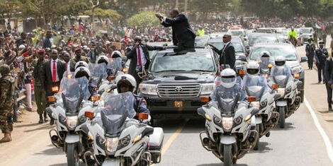Former President Uhuru Kenyatta alongside his security detail at a past even in 2020.