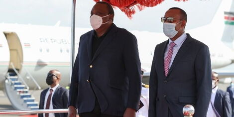 President Uhuru Kenyatta is received by Ethiopia Prime Minister at Bole International Airport on Tuesday, June 8