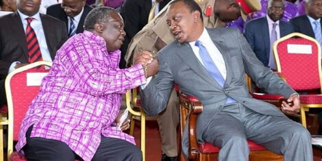 President Uhuru Kenyatta (right) with COTU boss Francis Atwoli at Uhuru Park, Nairobi, during Labour Day celebrations on May 1, 2017 