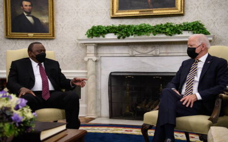 President Uhuru Kenyatta (left) meets with U.S President Joe Biden in the Oval Office of the White House in Washington, October 14, 2021.