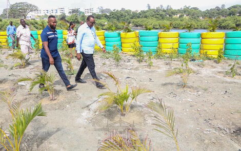 President Uhuru Kenyatta with Mombasa Governor Hassan Joho inspecting Kibarani during the initial stages of its transformation