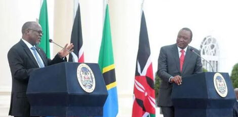 President Uhuru Kenyatta (right) with his late Tanzanian counterpart John Magufuli at a previous press conference in 2017. 