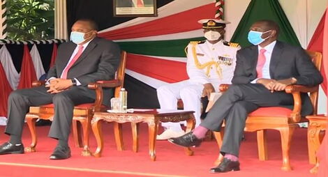 President Uhuru Kenyatta (left) with his deputy William Ruto (right) during Madaraka Day celebrations State House, Nairobi on June 1, 2020