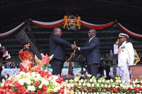 President William Ruto receives the instruments of power from President Uhuru Kenyatta on September 13, 2022.