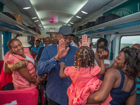 President Uhuru Kenyatta meets commuters on the Madaraka Express in December 2018.