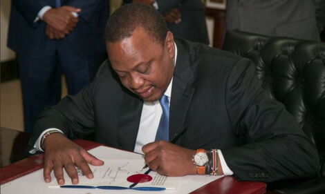 President Uhuru Kenyatta Signing Government Documents