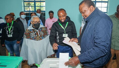 President Uhuru Kenyatta casting his vote at Mutomo primary school polling station on August 9, 2022.