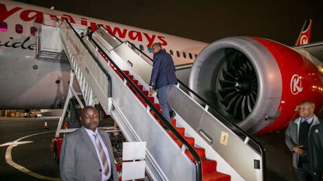 President Uhuru Kenyatta boards a Kenya Airways flight at the Jomo Kenyatta International Airport, Nairobi