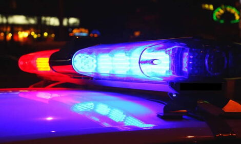Undated photo of red and blue lights atop a police car