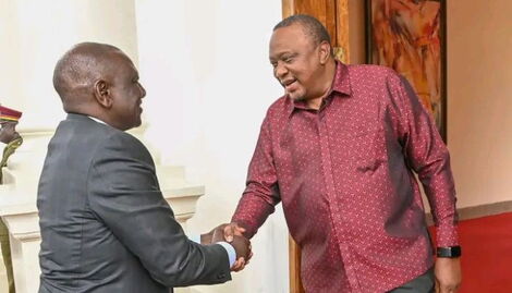 President-elect Wiliam Ruto shakes hands with outgoing President Uhuru Kenyatta at the State House on September 13, 2022