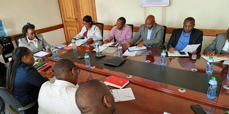 Controller of Budget Margaret Nyakang'o (canter) and Meru Governor Kawira Mwangaza (far right) during a meeting held on November 4, 2022.