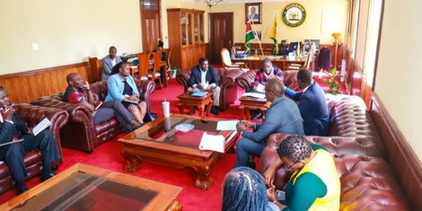 Sakaja and Njuki representing the Council of Governors in a meeting with the KPMDU officials