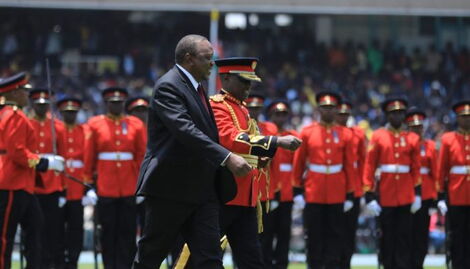 Former President Uhuru Kenyatta inspecting a guard of honor at Kasarani Stadium on Tuesday, September 13, 2022