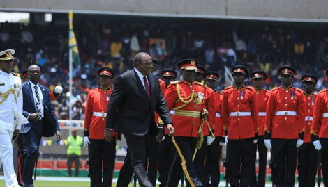 Former President Uhuru Kenyatta inspecting a guard of honor at Kasarani Stadium on Tuesday, September 13, 2022