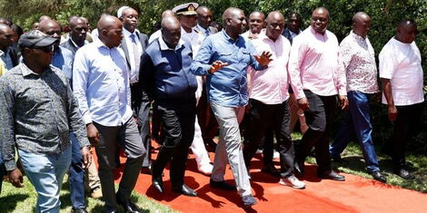 President William Ruto flanked by Deputy President Rigathi Gachagua walk out of a parliamentary group meeting held in Naivasha on September 17, 2022.