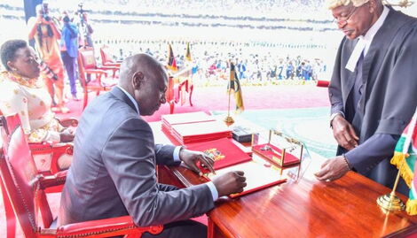 President William Ruto signing official documents of Oath of Office as President of Kenya at Kasarani Stadium on September 13, 2022