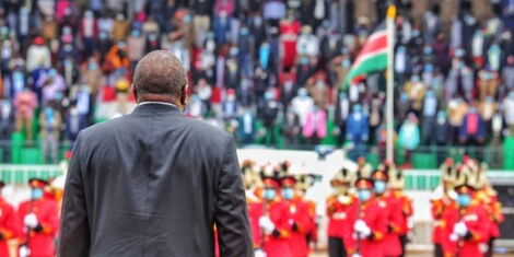 President Uhuru Kenyatta inspects the guard of honour during Mashujaa Day celebrations held at Wang'uru stadium in Kirinyaga County on October 20, 2021.