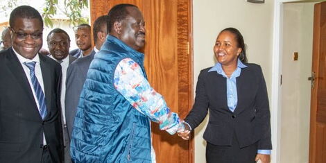 ODM Leader Raila Odinga (center) shakes hands with Samburu West MP Naisula Lesuuda on November 29, 2022. Looking on is the Leader of the Minority in the National Assembly Opiyo Wandayi. 