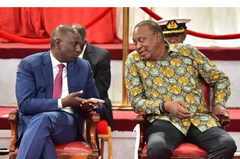 Deputy President William Ruto (left) and President Uhuru Kenyatta enjoy a hearty moment during the BBI launch at the Bomas of Kenya on November 27, 2019. 