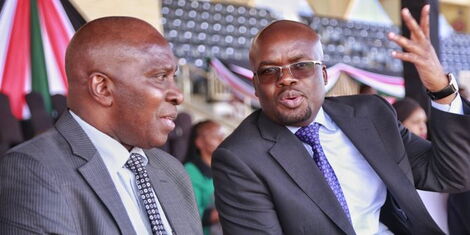 Interior Principal Secretary Raymond (right) and Digital Economy PS John Tanui share a moment during the inspection of the Nyayo National Stadium on Wednesday, December 7, 2022. 