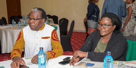 Former IEBC Commissioner Justus Nyang'aya (left) and Commissioner Irene Masit during a consultative meeting with partners and stakeholders on October 12, 2022. 