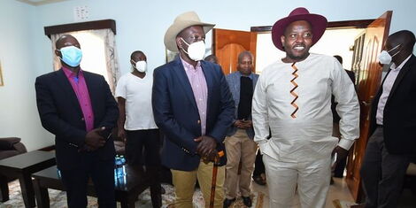 A photo of President William Ruto (left) and Nakuru County first gentleman Sam Mburu (right) and Interior CS Kithure Kindiki during the wedding ceremony on Nov. 7, 2020.