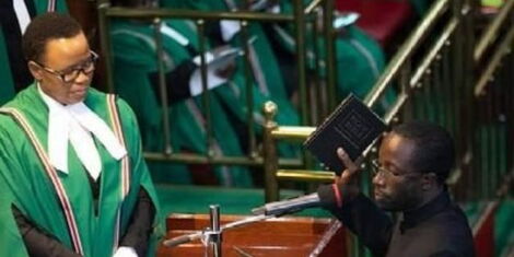 An image of Kitutu Masaba MP Clive Gisairo being sworn in Parliament.