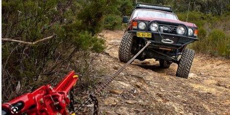 A photo showing a high-lift jack. 