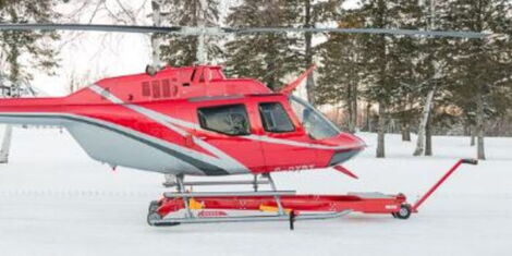 A photo a of chopper using a tow cart. 