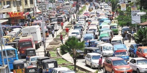 Vehicles caught i n a traffic snarl-up in Mombasa.
