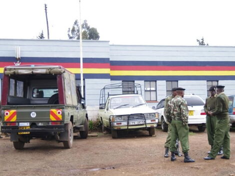 An undated image of vehicles parked outside a police station