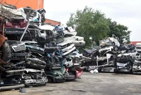 File photo of different imported vehicles destroyed at a warehouse