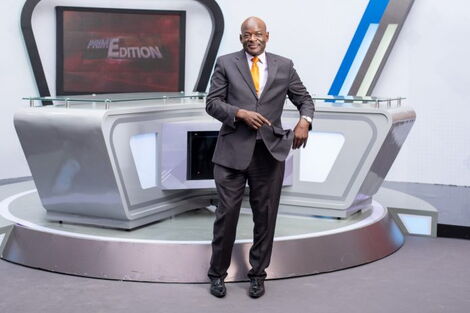 Veteran journalist Tom Mboya poses inside the revamped KBC studio