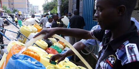 Nairobi residents getting water from a kiosk at one of the estates.
