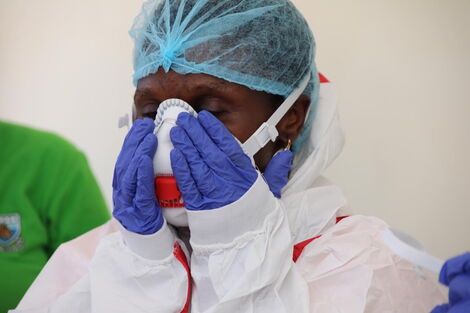 A medical practitioner dressed in protective gear at Coronavirus isolation and treatment facility in Mbagathi District Hospital on Friday, March 6, 2020.