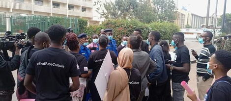 Police officers disrupt demonstration by University students in Nairobi