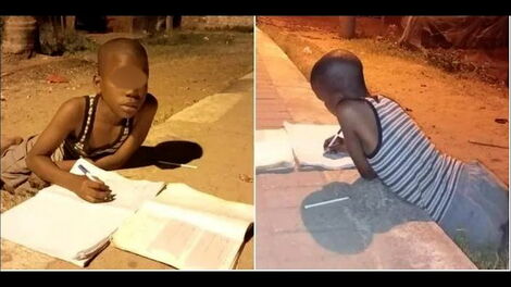 A Grade six student from Jola Urabi Primary School, Salim Khamisi, pictured writing his homework under a security light in Shanzu, Mombasa County.