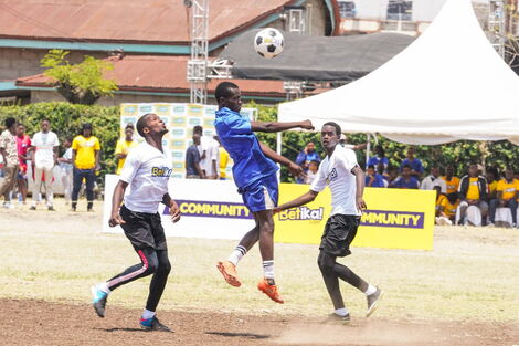 Players scramble for the ball during the Fundi Bingwa Cup held on Sunday, October 10, in Nairobi County.