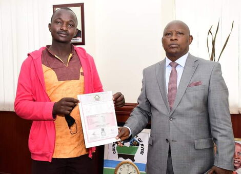 Nyeri Governor Mutahi Kahiga meets John Maina Muthoni, a driver, in his office on Tuesday, November 30.