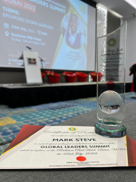 An award presented to Mark Steve during the Pan African Youth Leadership Foundation Global Summit.