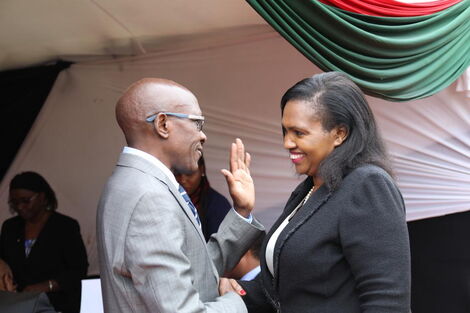 Kakamega Senator Boni Khalwale having a chat with Nakuru Senator Tabitha Karanja at Parliament buildings on September 7, 2022