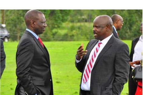 Deputy President William Ruto (left) speaks to former Bomet Governor Isaac Ruto at a past function.