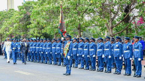 President William Ruto inspects a guard of honour mounted by members of the Kenya Air Force during the official opening of the 13th Parliament at the Parliament Buildings in Nairobi on September 29, 2022. 